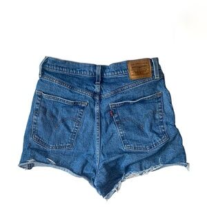 levis ribcage distressed medium wash denim shorts with button fly
